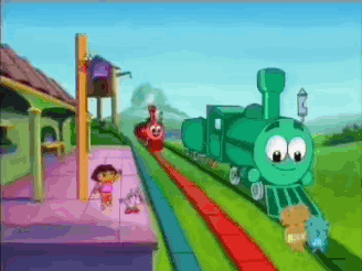 A Green Train With A Face On It Is Going Down A Train Track GIF