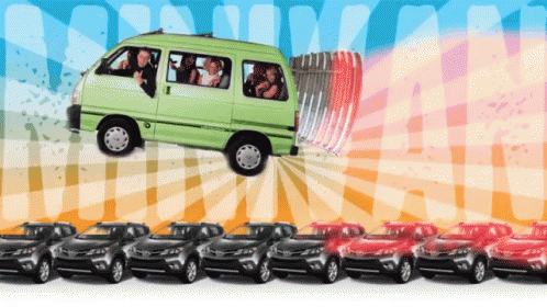 A Green Van Is Pulling A Fence In Front Of A Row Of Cars GIF