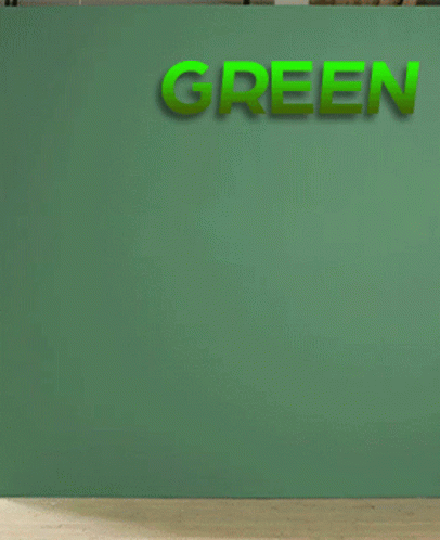 a green wall with the words go green above a shelf