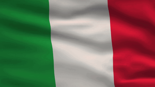 A Green White And Red Flag Is Being Blown In The Wind GIF