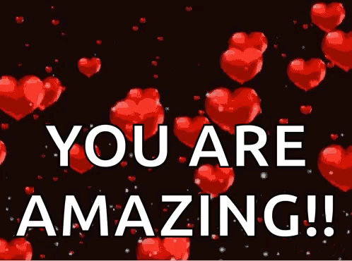 A Greeting Card That Says `` You Are Amazing '' With Red Hearts On A Black Background . GIF