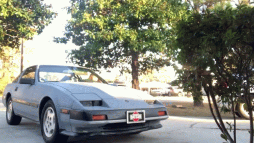 A Grey Car With A License Plate That Says ' Ohio ' On It GIF