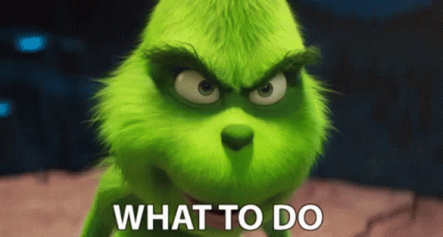 A Grinch From The Movie The Grinch Is Asking What To Do . GIF