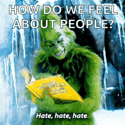 A Grinch Is Reading A Book With The Words How Do We Feel About People Hate Hate Hate GIF