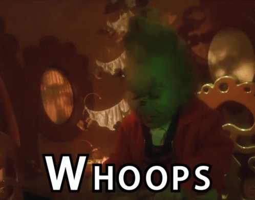 A Grinch Is Sitting In A Room With The Words Whoops Above Him GIF