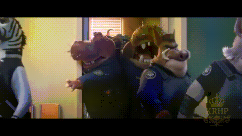 A Group Of Animals Dressed As Police Officers Are Standing In A Room . GIF