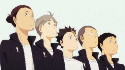A Group Of Anime Characters Are Standing In A Line And Looking Up At The Sky . GIF