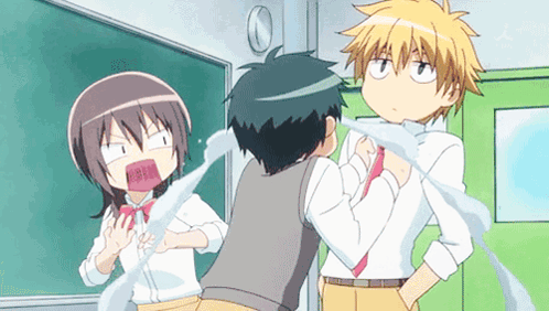 A Group Of Anime Characters Are Standing In Front Of A Chalkboard GIF