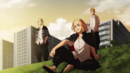 A Group Of Anime Characters Are Standing In Front Of Buildings GIF