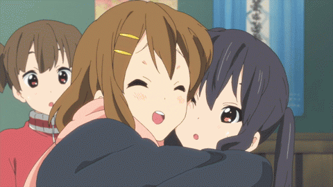 A Group Of Anime Girls Are Hugging Each Other And One Of Them Has A Surprised Look On Her Face GIF