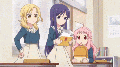 A Group Of Anime Girls Are Standing In A Classroom . GIF