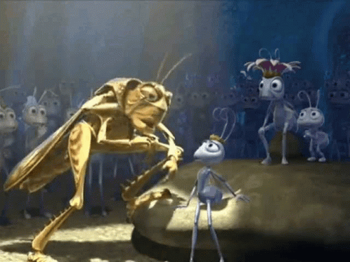 A Group Of Ants Wearing Crowns Are Standing Around A Small Ant Wearing A Crown GIF