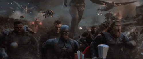A Group Of Avengers Are Fighting Each Other In A Battle Scene GIF