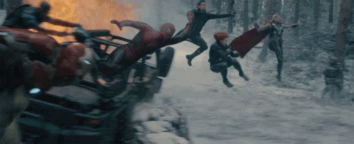 A Group Of Avengers Are Fighting Each Other In The Snow GIF