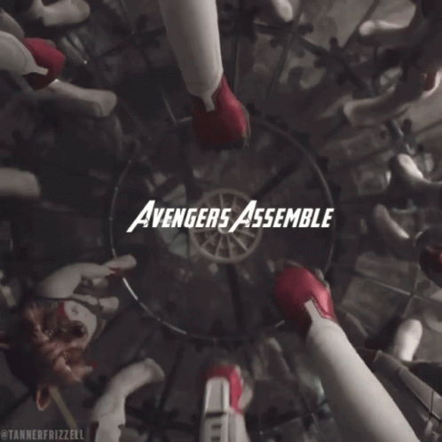 A Group Of Avengers Assemble In A Circle With Their Hands Together GIF