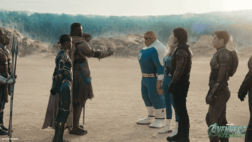 A Group Of Avengers Stand In A Desert GIF