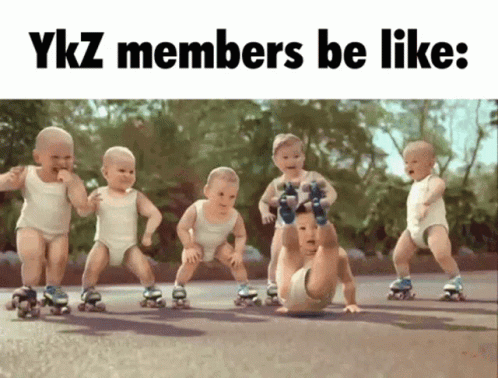 A Group Of Babies Wearing Roller Skates With The Words " Ykz Members Be Like " Above Them GIF