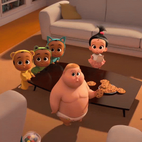 A Group Of Baby Cartoon Characters Standing Around A Table With Cookies On It GIF