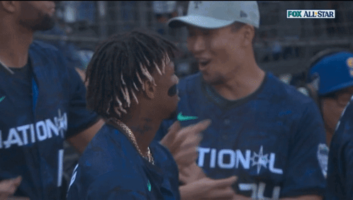 A Group Of Baseball Players Are Wearing Fox All Star Jerseys GIF