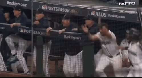 A Group Of Baseball Players In A Dugout With Fox Alds On The Bottom Right GIF