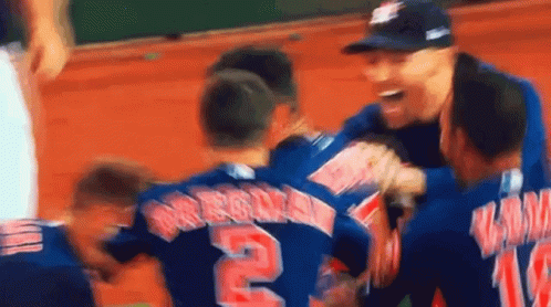 A Group Of Baseball Players One Of Whom Is Number 2 GIF