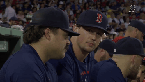 A Group Of Baseball Players Wearing Hats With The Letter B On It GIF