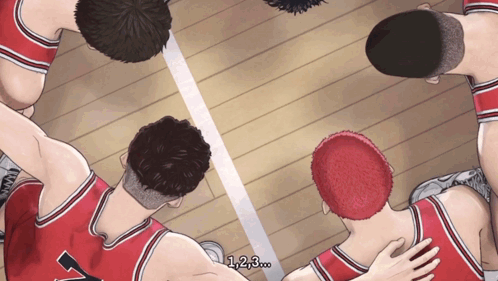 A Group Of Basketball Players Are Huddled Together With The Number 7 On The Back Of Their Jersey GIF