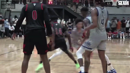 A Group Of Basketball Players Are Playing A Game And One Player Has The Number 4 On His Jersey GIF