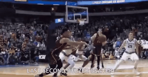 A Group Of Basketball Players Are Playing A Game Of Basketball And The Last Second Buzzer Beater Is Being Shouted . GIF