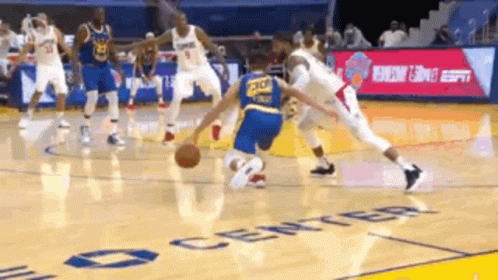 A Group Of Basketball Players Are Playing A Game On A Court That Says Center On It . GIF