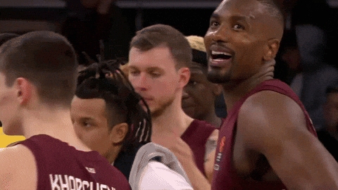 A Group Of Basketball Players One Of Whom Is Wearing A Shirt That Says Khadrau GIF