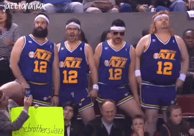 A Group Of Basketball Players Wearing Utah Jazz Uniforms GIF
