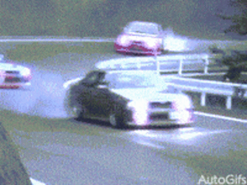 A Group Of Cars Are Driving Down A Highway And The Words Autogifs Are On The Bottom Right GIF