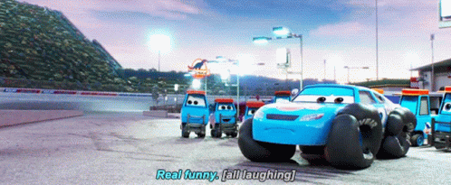 A Group Of Cars Are On A Race Track And One Of Them Says " Real Funny " GIF