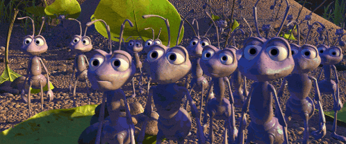 A Group Of Cartoon Ants Are Standing In A Line GIF