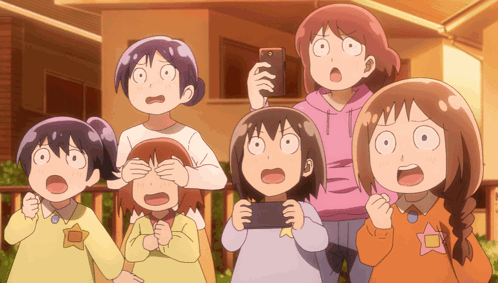 A Group Of Cartoon Characters Are Looking At A Cell Phone GIF