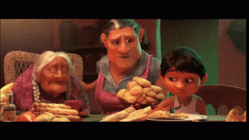 A Group Of Cartoon Characters Are Sitting At A Table With Food GIF