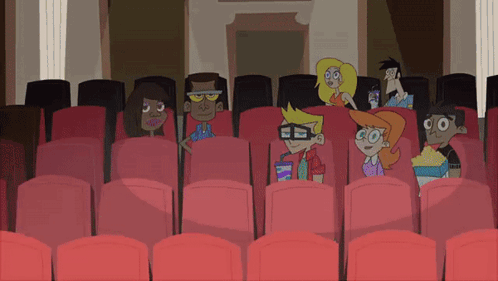 A Group Of Cartoon Characters Are Sitting In A Movie Theater GIF