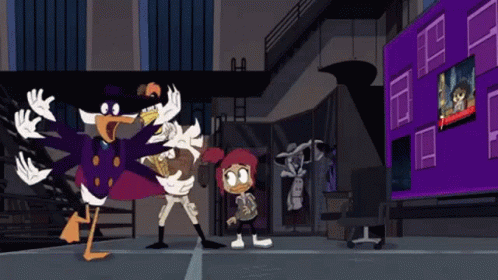 A Group Of Cartoon Characters Are Standing In Front Of A Large Screen That Says ' Ducktales ' On It GIF