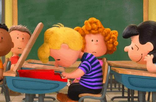 A Group Of Cartoon Characters Sit At Desks In A Classroom GIF