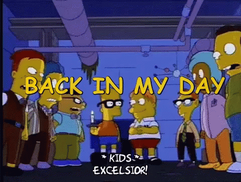 A Group Of Cartoon Characters Standing Next To Each Other And The Words Back In My Day Kids Excelsior GIF