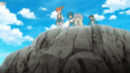 A Group Of Cartoon Characters Standing On Top Of A Large Rock . GIF