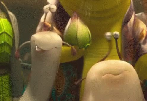A Group Of Cartoon Slugs Are Standing Next To Each Other And One Of Them Has A Flower On Its Head GIF