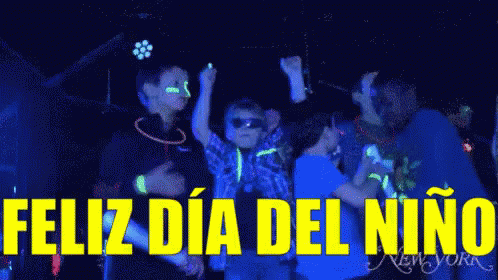 A Group Of Children Are Dancing In A Dark Room And The Words Feliz Dia Del Niño Are Written In Yellow GIF