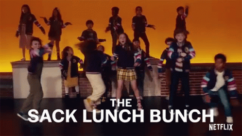 A Group Of Children Are Dancing On A Stage With The Words " The Sack Lunch Bunch " Written Above Them GIF