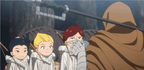 A Group Of Children Are Standing In Front Of A Man With A Hood GIF
