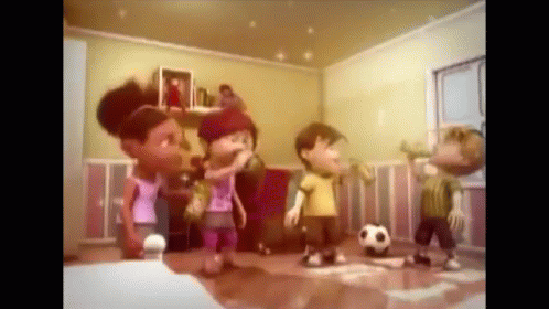 A Group Of Children Playing With A Soccer Ball In A Room GIF