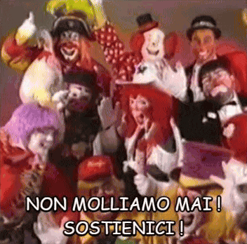 A Group Of Clowns Are Posing For A Picture And The Caption Says Non Molliamo Mai Sostienici GIF