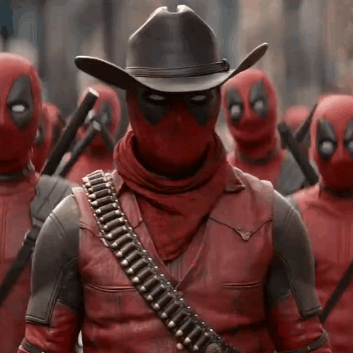 A Group Of Deadpools Are Standing In A Line Wearing Cowboy Hats . GIF