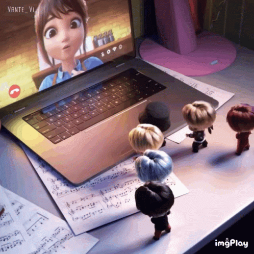A Group Of Dolls Are Standing In Front Of A Laptop That Says Vante_vi On The Screen GIF